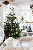 Christmas tree in white living room