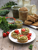 Kale cream and cherry tomatoes on country bread