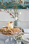 A yeast dough wreath with a white chocolate Easter bunny