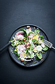 Wild herb salad with radishes and yoghurt dressing