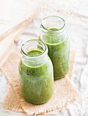 Green brain smoothie with kale, avocado and blueberries