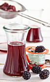 Homemade blackberry liqueur in a preserving jar