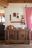 Old wooden trunk in traditional farmhouse parlour