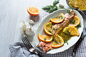Salmon trout with orange sauce and dill