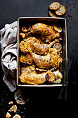 Roast Chicken Legs with sliced garlic