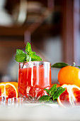 Blood Orange Cocktail with Mint Garnish