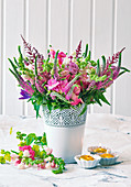 Bouquet of veronica, astilbes, snapdragons and roses