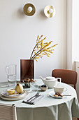 Simply set breakfast table in natural shades