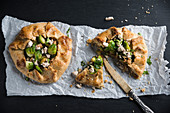 Vegan spelts and whole grain galettes with brussels sprouts and tofu
