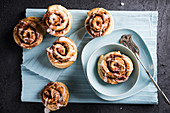 Vegan yeast snails with strawberry-rhubarb-coconut filling and frosting