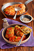 Stuffed savoy cabbagee with lentils, mushrooms and feta in tomato sauce