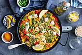 Paella with fish, pepper and green beans