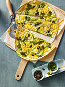 Zucchini, pesto and cheese tart