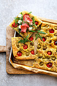 Focaccia with cocktail tomatoes and olives