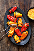 Stuffed mini peppers with pumpkin and chili sauce