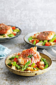 Monkfish saltimbocca with asparagus and bean vegetables