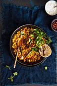 Indian spiced lentils with flat bread and fresh coriander