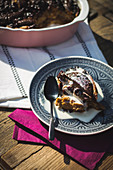 Kirschenmichel (cherry bread pudding) with gingerbread on a table outside