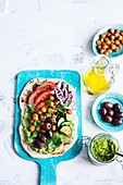 Vegan flat bread with kale hummus and vegetables