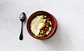Sweet millet porridge with dried fruits