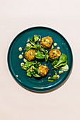 Chickpea fritters with lamb's lettuce