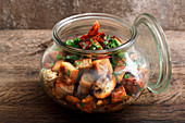 An autumnal bread salad with mushrooms and bacon