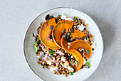 Autumnal pumpkin and lentil salad with goat's cheese