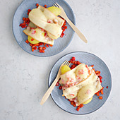 Potatoes with a cheese and pepper raclette