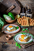 Waffles with avocado and eggs