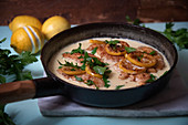 Chicken francese with lemon frying pan