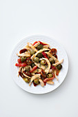 Hähnchenbruststreifen mit Paprika, gefüllte Oliven und getrockneten Tomaten