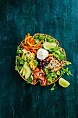 Taco salad bowl with chicken and green goddess dressing