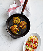 Courgette and carrot fritters with tomato salad