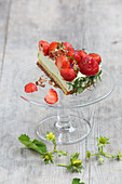 A piece of basil and strawberry cake