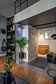 Masculine living room in shades of grey with mezzanine