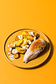 Roast chicken breast with oven-roasted vegetables