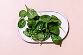 A dish of spinach leaves