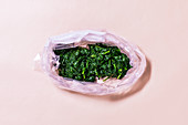 Spinach leaves being frozen