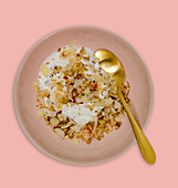 Breakfast yoghurt with grated apple and nuts