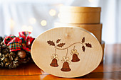 Wooden box with inlaid lid and Christmas decorations