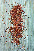 Linseed on a wooden background