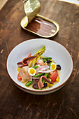 Bavarian salad Niçoise with trout
