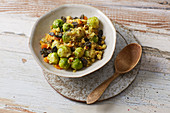 Fried Brussels sprouts with quinoa and tofu