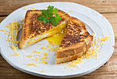 Grilled cheese sandwich with egg