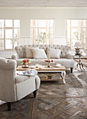 Cream Chesterfield furniture in elegant living room