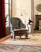 Vintage-style armchair with Viennese cane backrest in living room