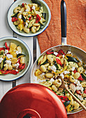 Brightly coloured gnocchi with vegetables