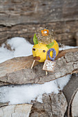 Lucky pig made from lemon as whimsical wintry decoration