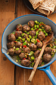 Spiced meatballs with broad beans