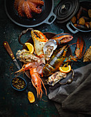 Seafood, fresh and cooked, with oranges and spices